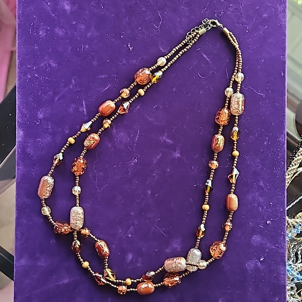 Multi-strand bronze tone, multi-color beaded necklace with matching earrings